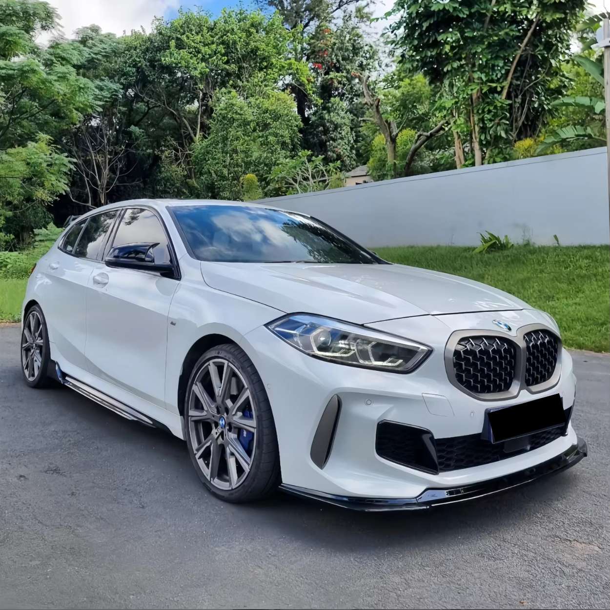 BMW Serie 1 F40 Lip Frontal Negro Brillo (2019-2024)